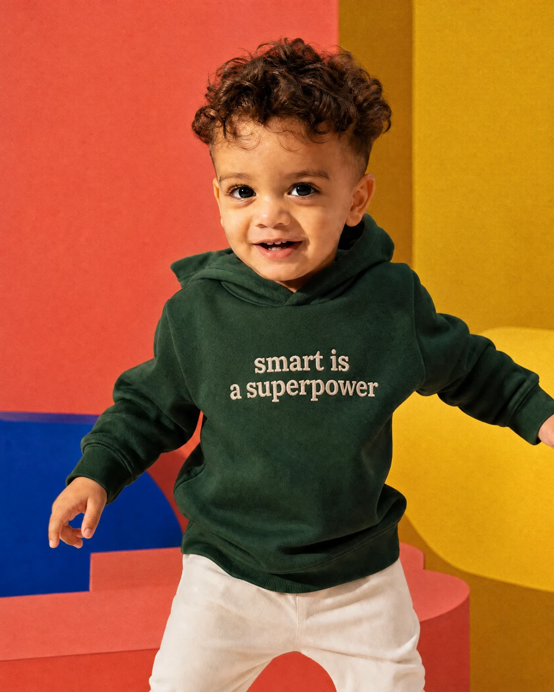 Kabir wearing the Boys Smart Is A Superpower Panel Drop with the exact statement “smart is a superpower” printed into the garment.