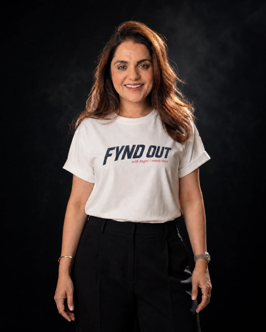 Ragini wearing the Women Original Fynd Out Wordmark Tee with the original FYND OUT with Ragini merch-store wordmark printed into the garment.