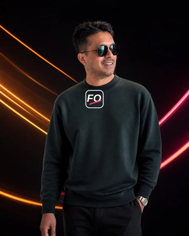 Farooq wearing the Men Tonal FO Signature Sweatshirt with the approved Fynd Out with Ragini logo.