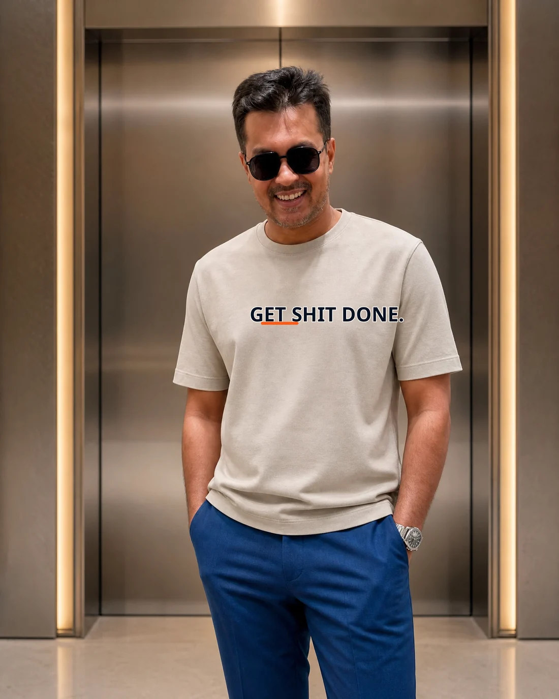 Farooq wearing the Men Get Shit Done Editor’s Mark featuring the exact statement “get shit done”.