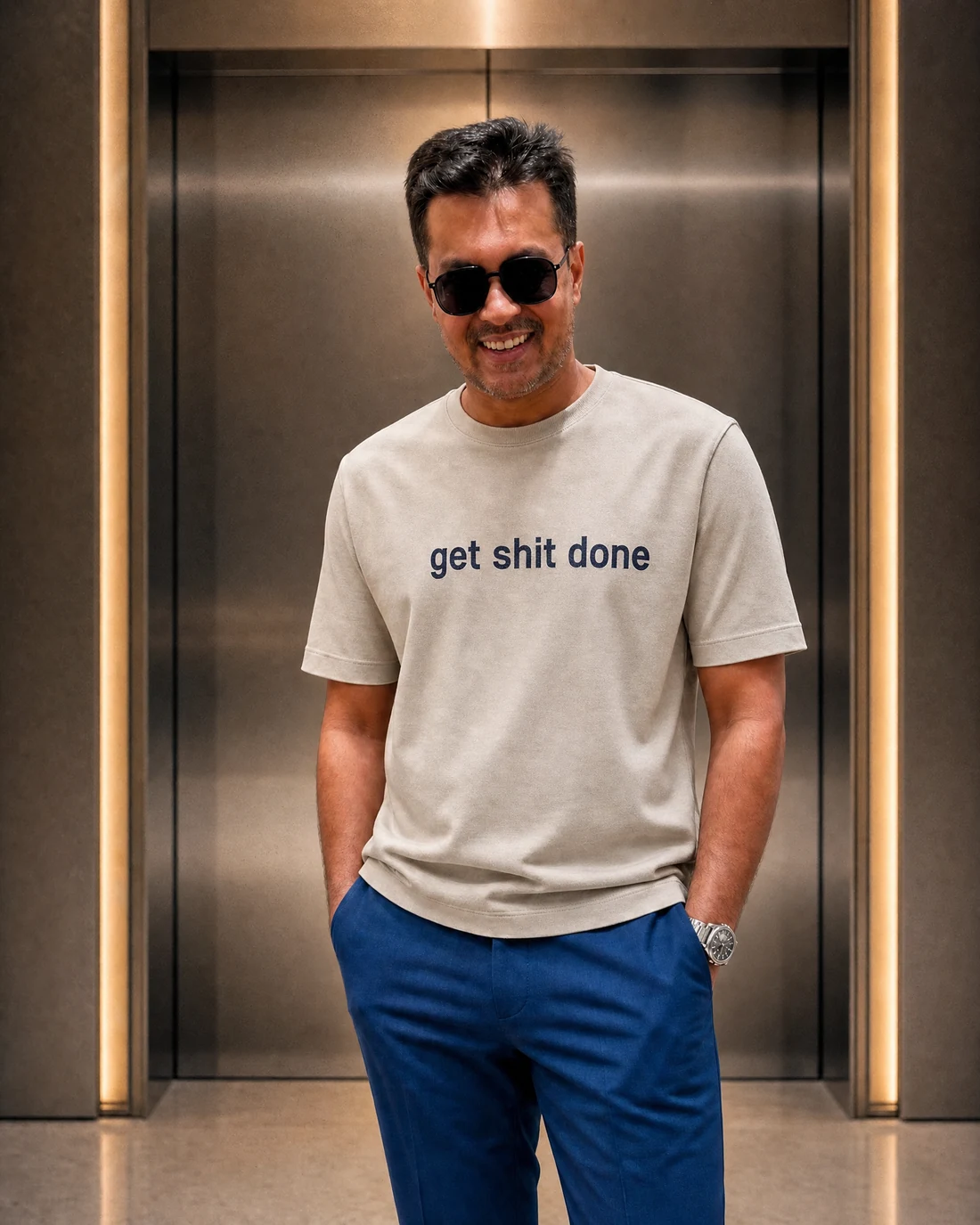 Farooq wearing the Men Get Shit Done Editor’s Mark with the exact statement “get shit done” printed into the garment.