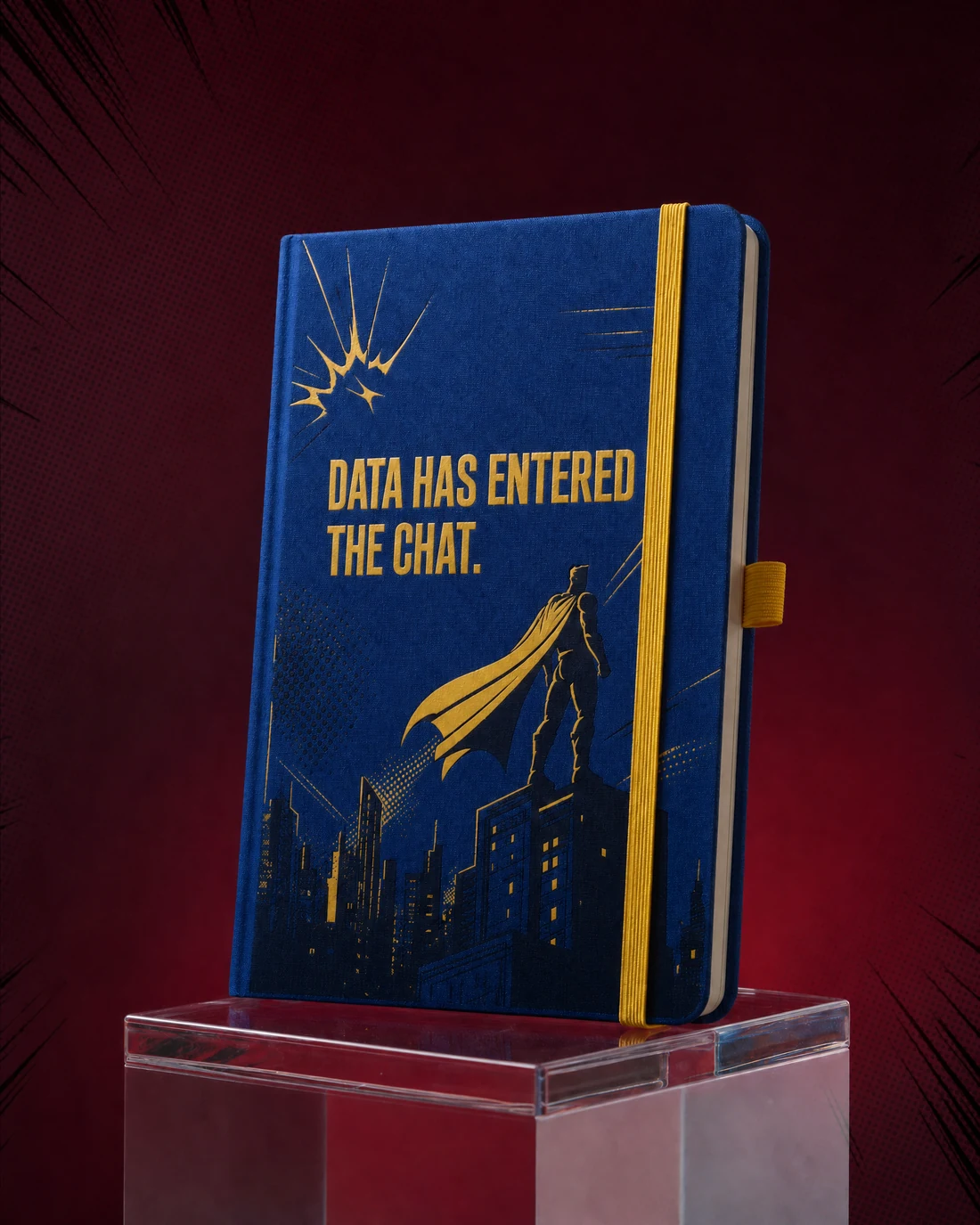 Cloth-bound notebook photographed as a real premium object with the exact statement “data has entered the chat” integrated into its material.