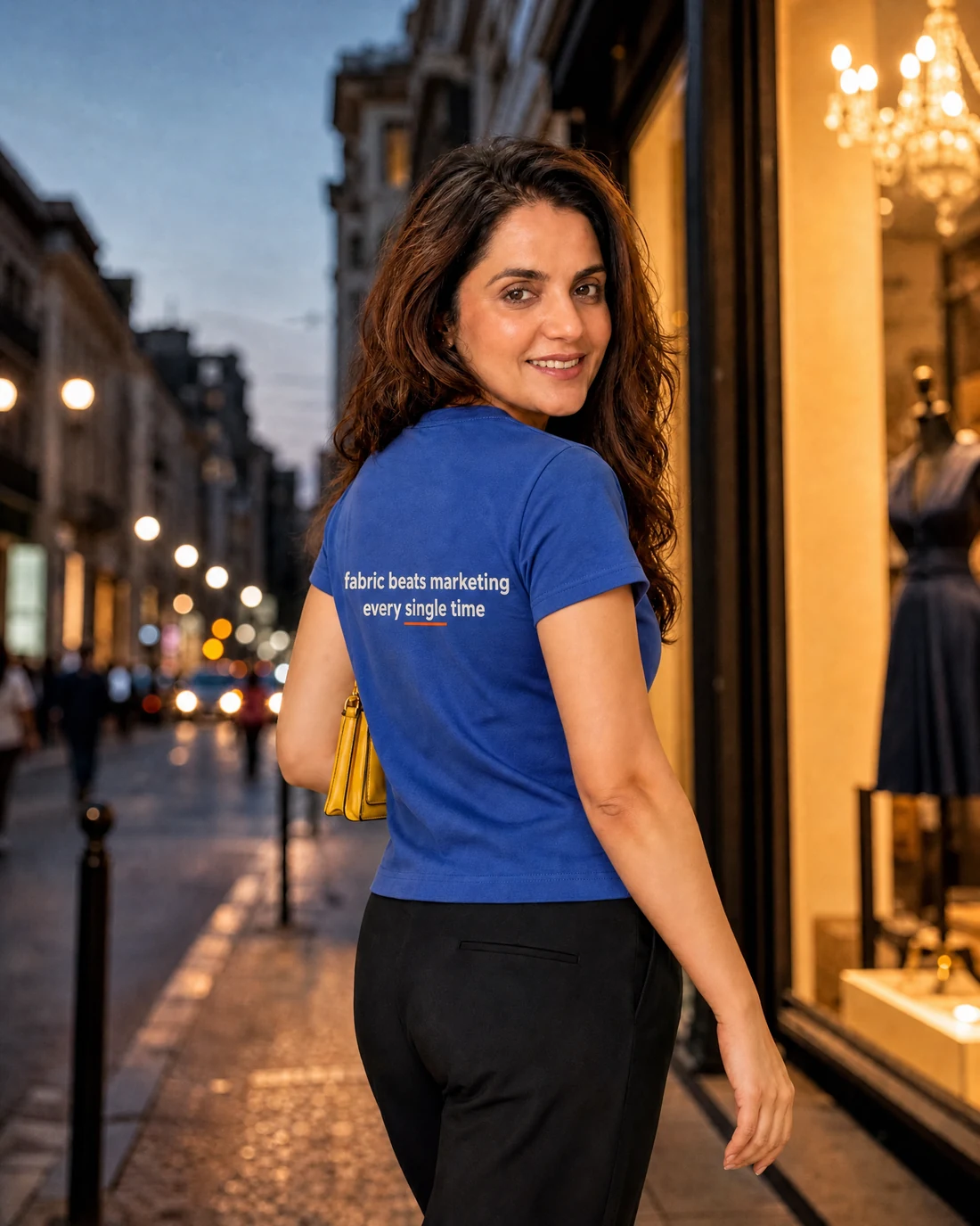 Ragini wearing the Women Fabric Beats Marketing Every Single Time Backstory with the exact statement “fabric beats marketing every single time” printed into the garment.