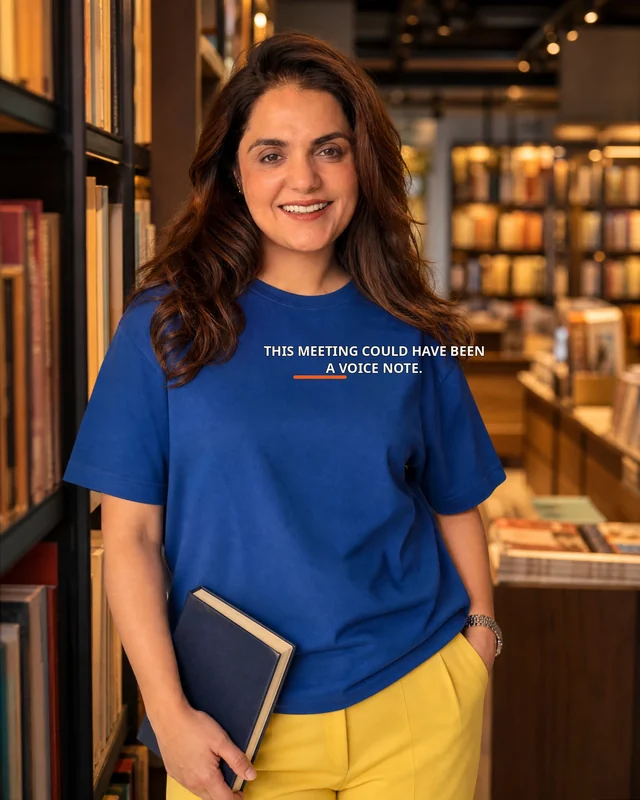 Ragini wearing the Women This Meeting Could Have Been A Editor’s Mark featuring the exact statement “this meeting could have been a voice note”.